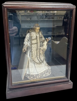 Lot 286 - A 19th century mahogany cased wax figure of St...