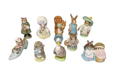 Lot 559 - BESWICK; a group of ten Beatrix Potter figures...