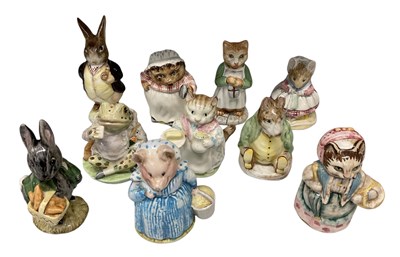 Lot 561 - BESWICK; a group of ten Beatrix Potter figures...