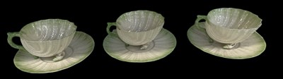 Lot 595 - BELLEEK; a set of three Irish 'Neptune'...