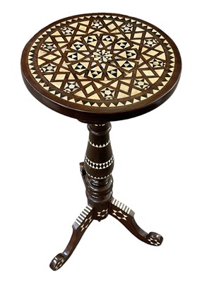 Lot 16 - An Islamic tripod table inlaid with mother of...