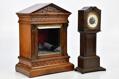 Lot 396 - An oak cased miniature longcase clock, the...