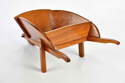 Lot 566 - A reproduction miniature wheelbarrow, length...