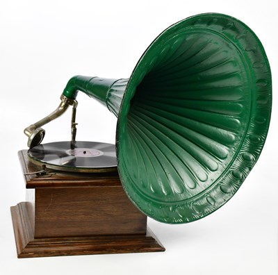 Lot 1100 - An early 20th century oak wind up gramophone...