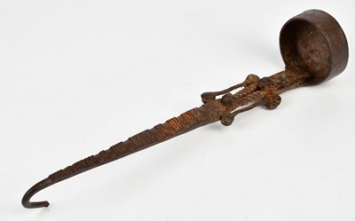 Lot 563 - A 17th century wrought iron ladle with open...