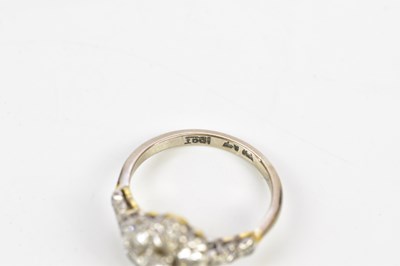 Lot 61 - An 18ct white gold diamond set floral dress...