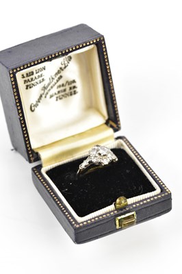 Lot 61 - An 18ct white gold diamond set floral dress...