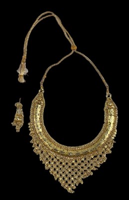 Lot 856 - A gilt metal Pakistani wedding gift necklace,...