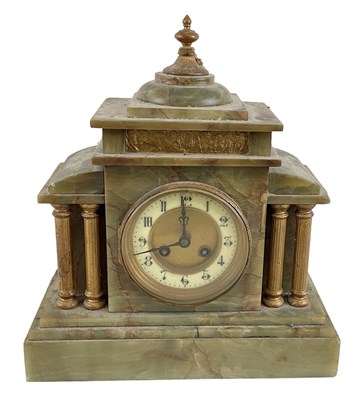 Lot 137 - A late 19th century French onyx mantel clock...