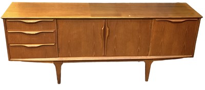Lot 9 - A teak mid century sideboard with three...