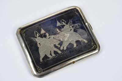 Lot 2242 - An Eastern white metal and niello cigarette...