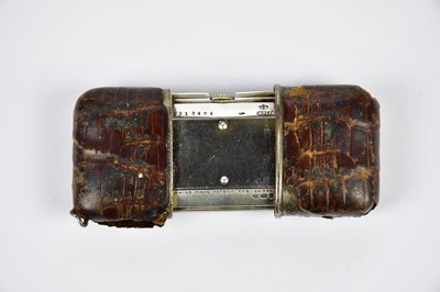 Lot 2354 - MOVADO; a crocodile skin cased purse watch,...