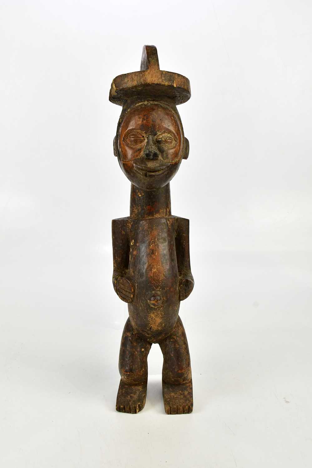 Lot 1328 - A Nkisi carved wooden Congo spirit figure,...