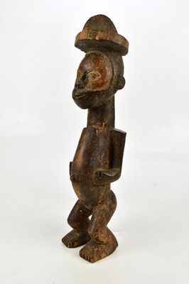 Lot 1328 - A Nkisi carved wooden Congo spirit figure,...