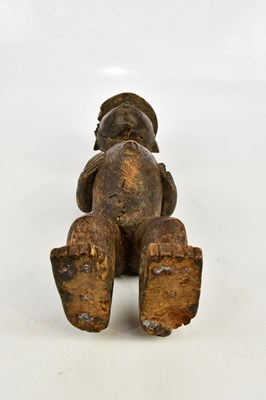 Lot 1328 - A Nkisi carved wooden Congo spirit figure,...