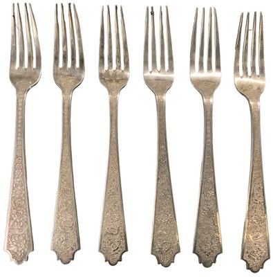 Lot 1298 - A set of six white metal forks, combined...