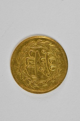 Lot 1611 - A small Persian/Iranian gold coin with a lion...