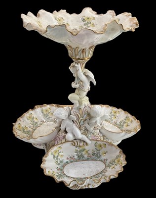 Lot 603 - A Continental porcelain figural and floral...