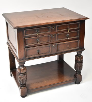 Lot 31 - A Victorian oak three-drawer side table with...