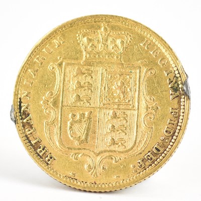 Lot 924 - A Victorian 1884 half sovereign, young head,...