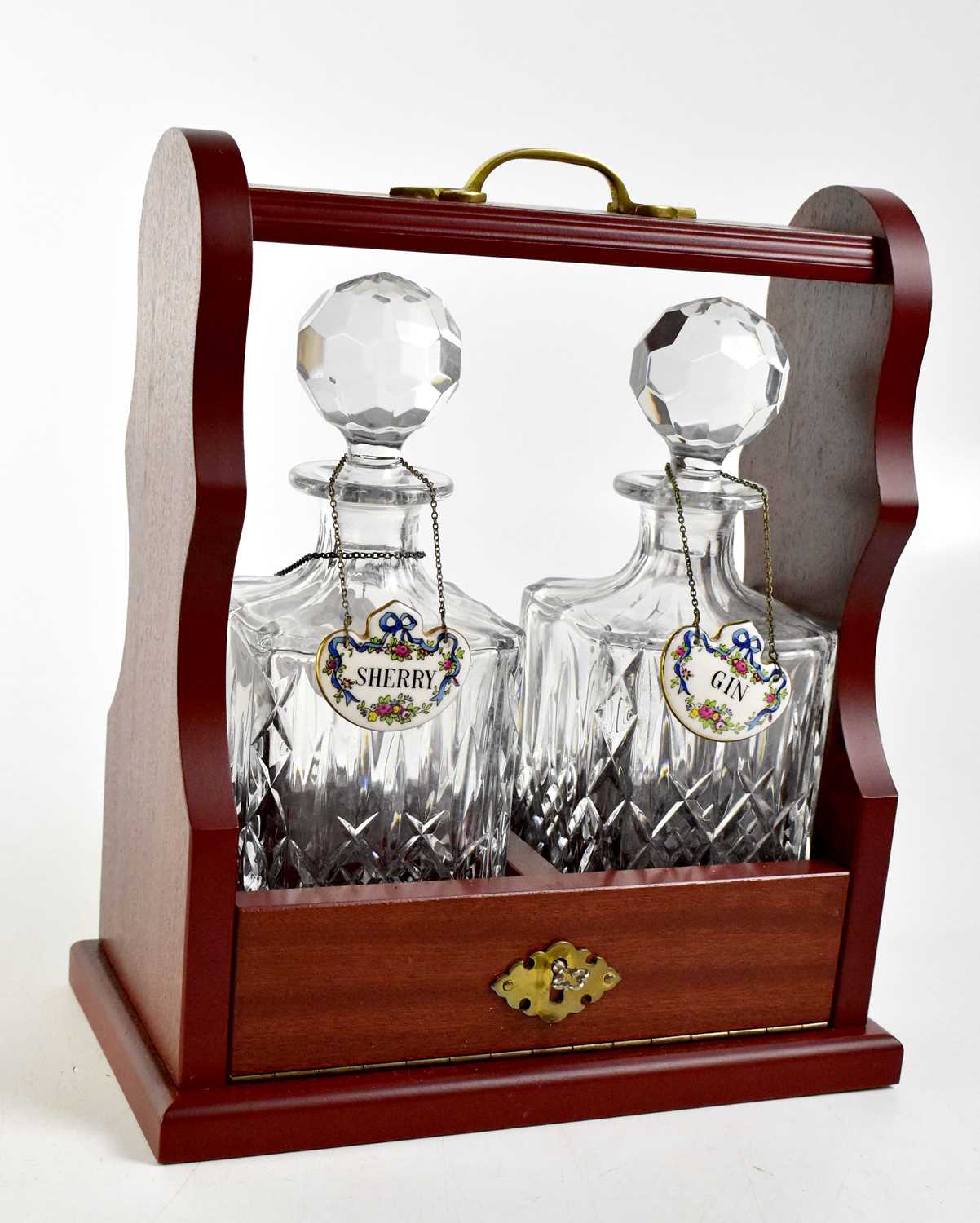 Lot 121 - A modern tantalus containing two square decanters