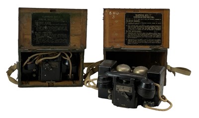 Lot 371 - A pair of British WWII field telephones (both...