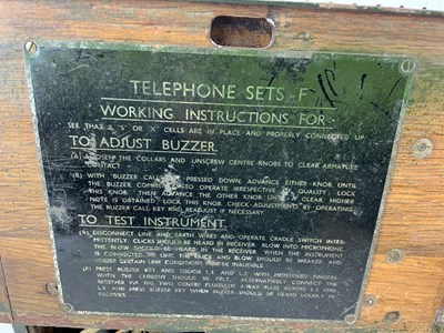 Lot 371 - A pair of British WWII field telephones (both...