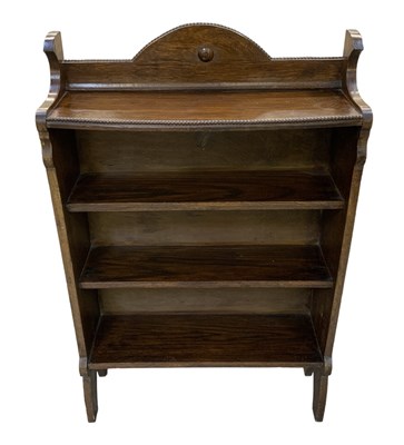 Lot 52 - A 1920s oak three tier bookcase, height 112cm,...