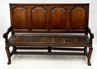 Lot 112 - A Georgian oak settle with four-section...