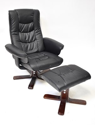 Lot 14 - A black faux leather reclining lounge chair...