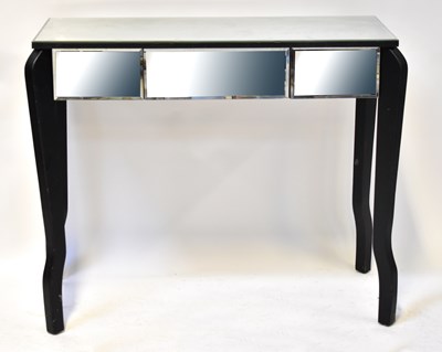Lot 16 - A mirrored side table with single drawer, to...