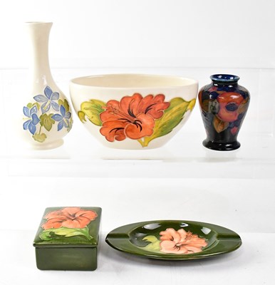 Lot 181 - MOORCROFT; five items comprising a vase...