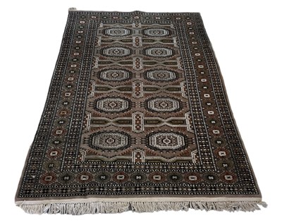 Lot 83 - A Persian silk cream and brown ground carpet...