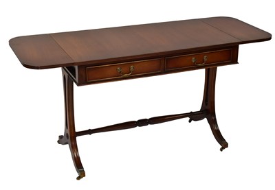 Lot 62 - A Georgian-style mahogany sofa table with two...