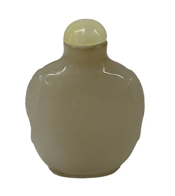 Lot 1091 - A Chinese carved green jade scent bottle,...