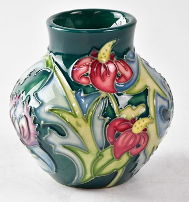 Lot 123 - MOORCROFT; a small vase in the 'Leicester'...