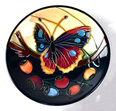 Lot 172 - MOORCROFT; a pin dish decorated with butterfly...