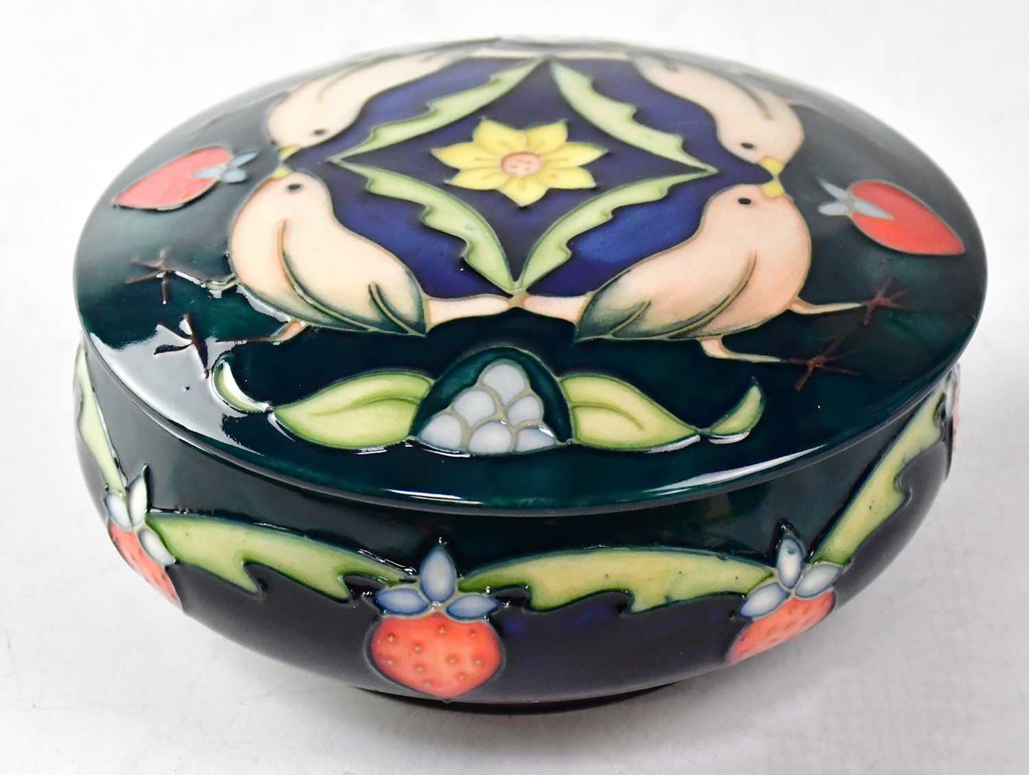 Lot 170 - MOORCROFT; a trinket pot in the 'Strawberry...