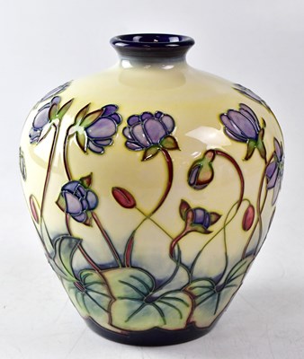 Lot 134 - MOORCROFT; a vase in the 'Hepatica' design,...