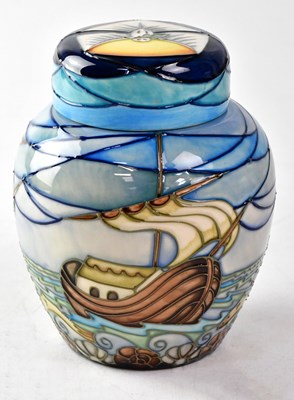 Lot 163 - MOORCROFT; a ginger jar and cover in the...