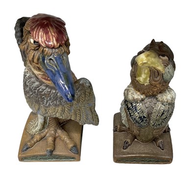 Lot 568 - BURSLEM POTTERY; two grotesque birds, inspired...