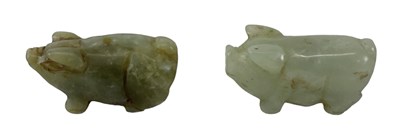 Lot 1064 - Two small Chinese jade figures of pigs, height...