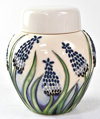 Lot 166 - MOORCROFT; a jar and cover in the 'Muscari'...