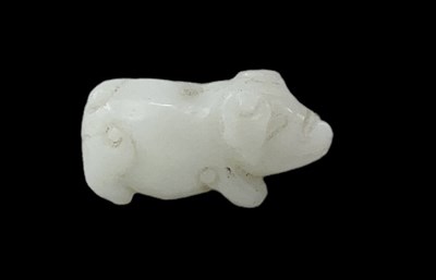 Lot 1082 - A Chinese carved white hardstone figure of a...