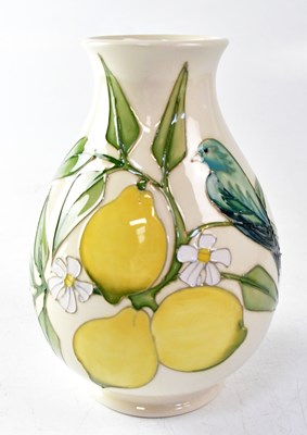 Lot 136 - MOORCROFT; a vase in the 'Lemons' design by...