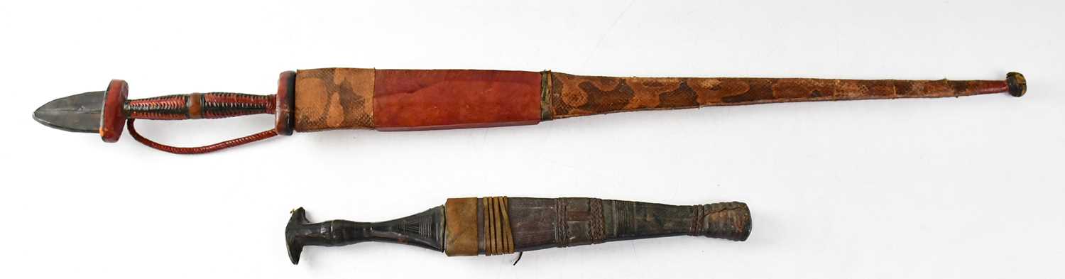 Lot 530 - An African hunting sword with narrow 57cm...