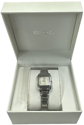 Lot 1463 - SEIKO; a lady's stainless steel wristwatch...