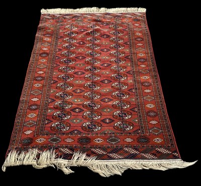 Lot 96 - A modern red ground Persian style carpet with...