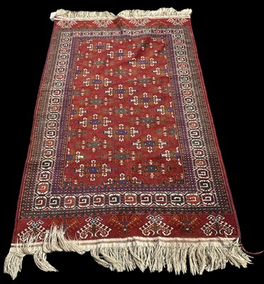 Lot 92 - A modern red ground Turkmenistan Yamout hand...