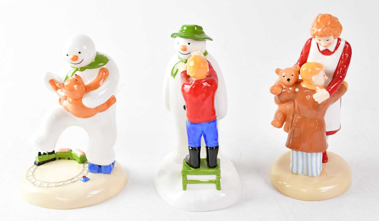 Lot 201 - THE SNOWMAN; three Coalport Characters figures,...